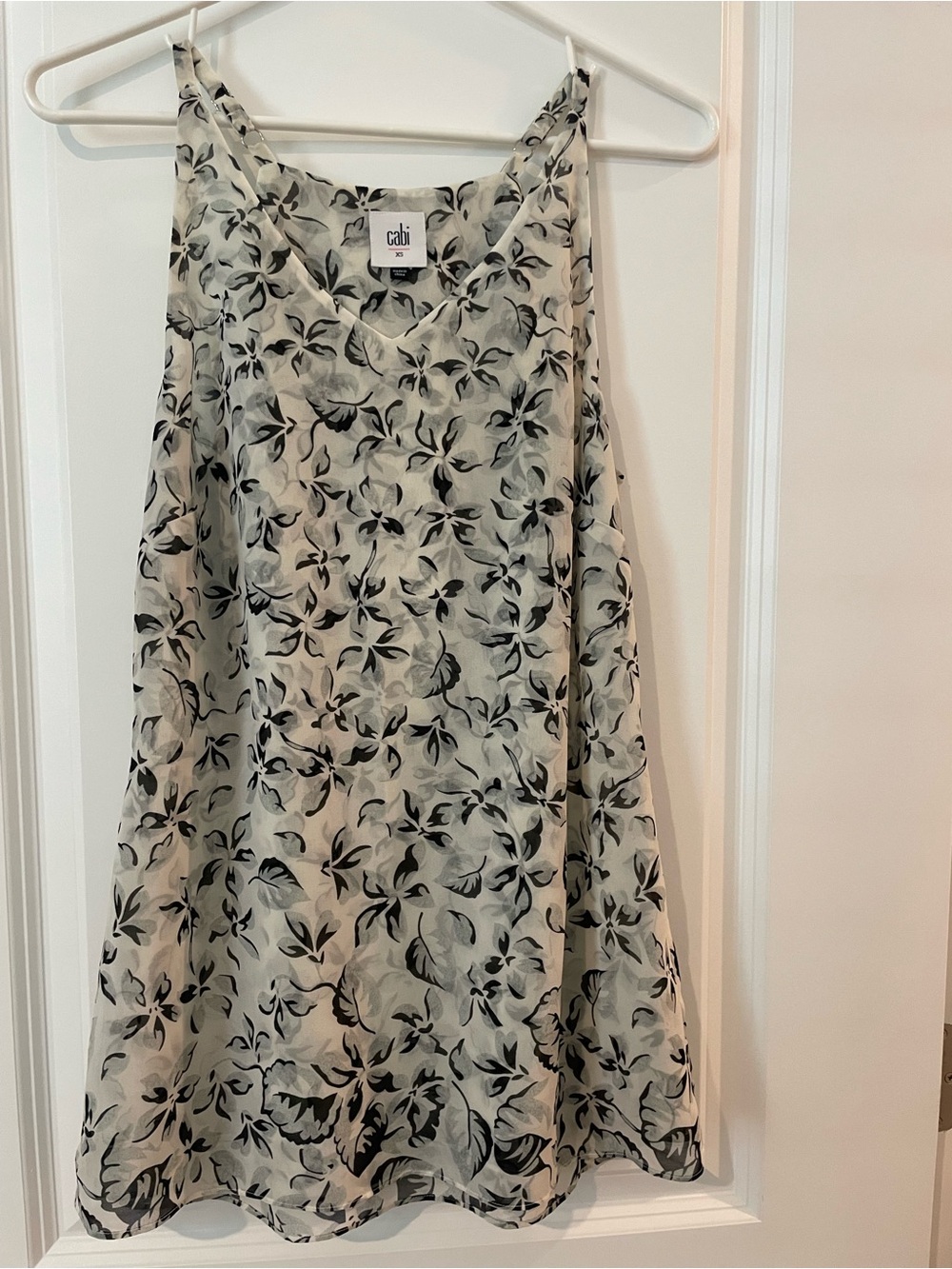 CAbi Terrace Cream Slip A-Line cami with Black Floral Print
